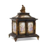 A Vienna enamel panelled miniature table cabinet, late 19th/early 20th century, with a model of a