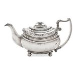 A George III silver teapot, London, c.1819, William Bateman I, the body of stepped rectangular form,