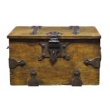 A North European oak strong box, 19th Century, with two ring handles and shaped iron strapwork, with