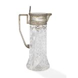 A silver mounted cut glass water pitcher, bears marks, the cylindrical cut glass body with hobnail