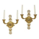 A pair of Empire style wall lights, 20th century, with circular lobed and palmette and wheat sheaf