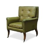 A Regency library armchair, with square back and curved armrests, upholstered in green leather,