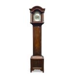 A mahogany grandmother clock, late 19th/ early 20th century, the hood with arched cornice, with