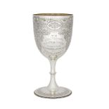 An Edwardian silver cycling trophy, Sheffield, c.1901, Walker & Hall, the large goblet-shaped cup