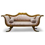 A Continental walnut and marquetry inlaid sofa, 19th Century, with shaped back, upholstered in