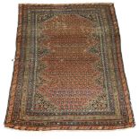 A Bijar rug, early 20th Century, with rows of Botehs in deep red field and with multiple border,