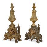 WITHDRAWN A pair of Louis XIV style andirons, 19th century, applied with a male mask to the front