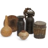 Two African hardwood flasks, of turned cylindrical form and flaring necks, with stoppers, 21 and