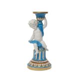 A Minton single blue and gilt porcelain candlestick, 19th century, moulded in the form of a cherub