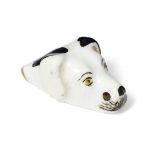 A small Staffordshire pottery whistle in the form of a dog's head, 19th century, 3.3cm longgood