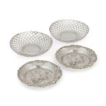 Two small silver dishes, London, c.1896, James Dudley, each with repousse scene to base depicting