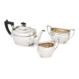 A three piece silver tea set, Sheffield, c.1923, Alexander Clark & Co., comprising a teapot, sugar