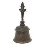 An Indian bronze bell, 20th century, with a figural handle, 20.5cm highPlease refer to department