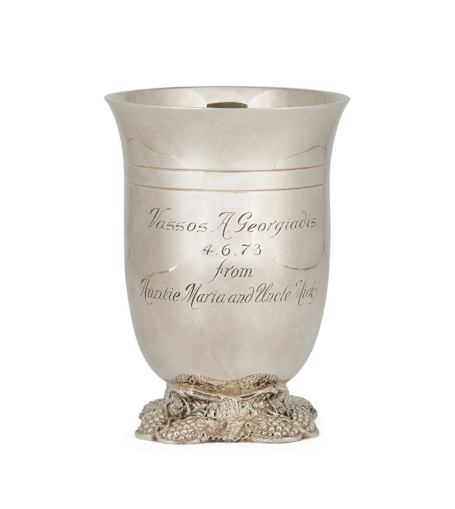 A silver wine beaker, London, c.1971, Garrard & Co., raised on a quatrefoil foot decorated with