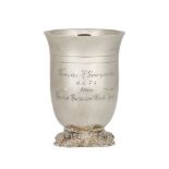 A silver wine beaker, London, c.1971, Garrard & Co., raised on a quatrefoil foot decorated with