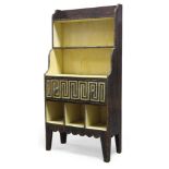 A Regency style faux rosewood painted waterfall bookcase, 20th Century, with two open shelves