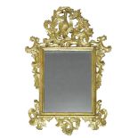 A George II style gilt mirror, 20th Century, the pierced crest with carved ho ho bird and