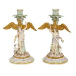 A pair of Meissen porcelain allegorical candlesticks, probably candelabra bases, late 19th