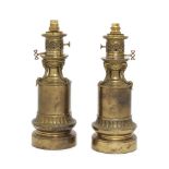 A pair of Victorian brass sinumbra lamps, early/mid 19th century, each with pierced Gothic tracery