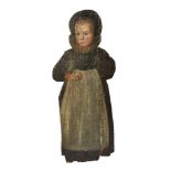 A painted pine figural dummy board,18th/19th century, portraying a young girl wearing a white