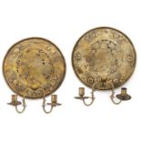 A pair of Dutch taste circular brass pierced wall lights, late 19th/early 20th century, pierced