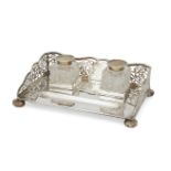 A pierced silver inkstand with squared cut glass inkwells, Birmingham, c.1906, S. Glass, the