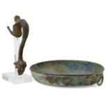 A Roman bronze dish with lion mask handle, 21.3cm maximum diam., and Roman bronze handle, a siren