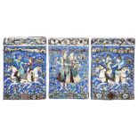 Three Qajar underglaze-painted moulded pottery tiles, Iran, 19th century, two depicting pairs of