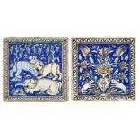 A pair of moulded Qajar pottery tiles, Iran, 19th century, the first depicting a large vase of