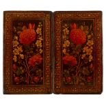 A pair of Qajar lacquered papier mache book bindings, Iran, early 19th century, each of