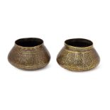 Two small Veneto-Saracenic brass inlaid bowls, probably Mamluk Syria, 15th century, of similar