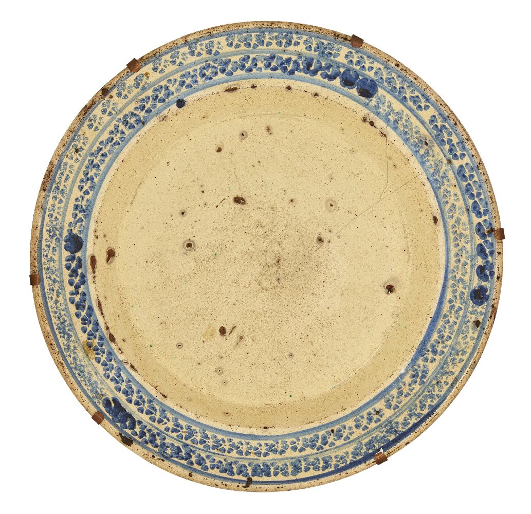 A rare and early Canakkale pottery dish, Ottoman Turkey, late 17th/early 18th century, of deep form,