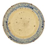 A rare and early Canakkale pottery dish, Ottoman Turkey, late 17th/early 18th century, of deep form,