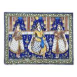 A pair of Qajar underglaze moulded pottery tiles, Iran, 19th century, depicting three dancers and