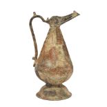 A Khorasan faceted silver inlaid bronze ewer, Iran, 12th century, of globular form on a domed