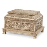 A carved bone casket with inscriptions, India, 19th century, on four square feet, the lid and