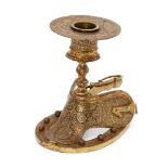 A koftari work steel candlestand in the form of a saddle, North India, 19th century, the base in the
