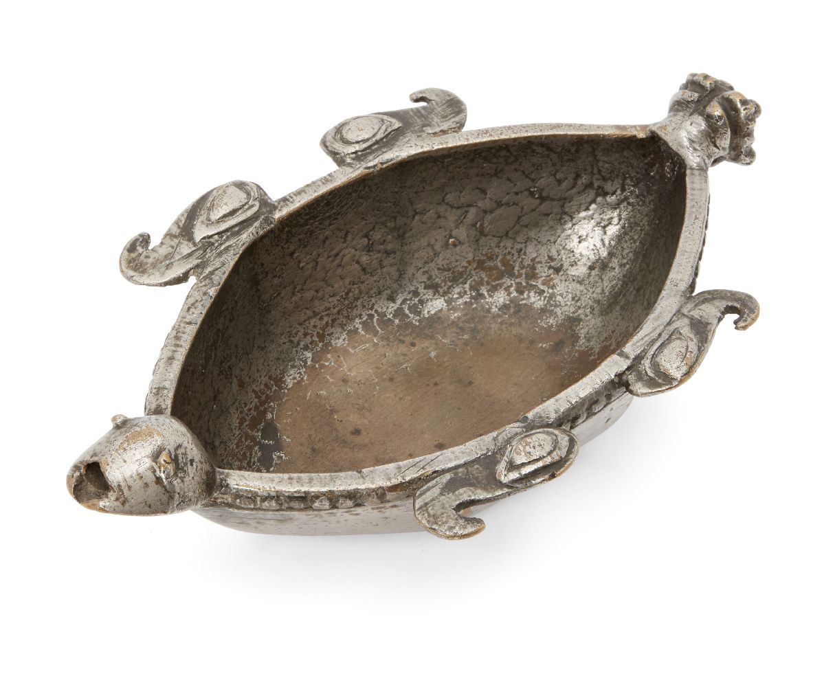 A silvered brass bowl in the form of a turtle, India, 18th century, of oval, faceted form, the rim