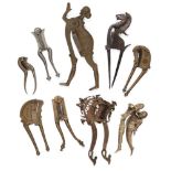 A group of nine betel nut cutters India, 20th century and earlier, in steel, copper and brass, of