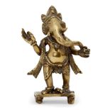 A brass figure of Ganesh, India, 19th century, on a raised rectangular base with four feet, standing
