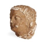 A Gandharan stucco head of a moustachioed man, Afghanistan, 2nd-3rd century, 9.5 x 8x 8.5 cm