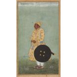A standing courtier, Deccan, India, 18th century, opaque pigments heightened with gilt on paper,