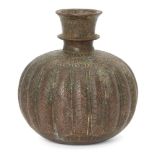 An engraved bronze huqqa base, India, early 19th century, of spherical fluted form, the deeply