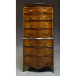 A George III style serpentine burr walnut and mahogany chest on chest, early 20th Century, the