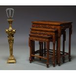 A nest of three Chinese hardwood and brass inlaid tables, 20th Century, each with carved dragon