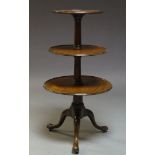 A George III mahogany three-tier dumb waiter, with turned tapering supports to tripod base, 100cm