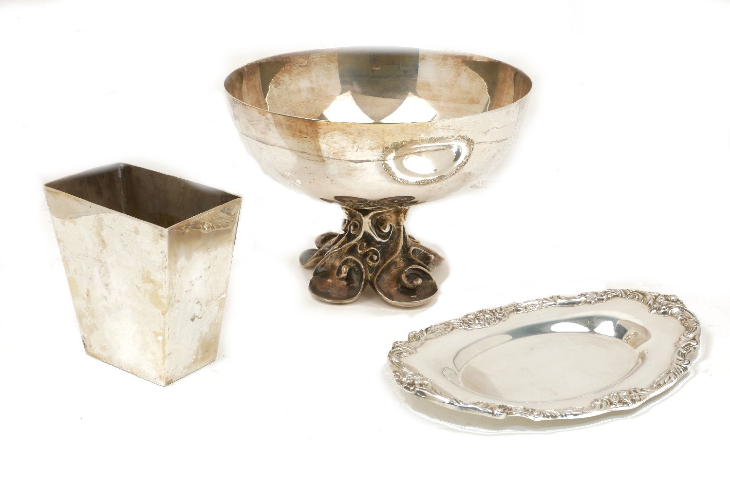 A Continental silver plated bowl on a sea scroll pedestal with four scrolling feet, twentieth