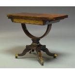 A Regency rosewood card table, the fold over top enclosing green baize lined playing surface, raised