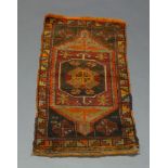 Two Turkmen bags, a small Turkish rug and two pairs of Turkmen saddle bags (5)100