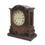 An early Victorian mahogany bracket clock by James Mc Cabe, the architectural form case enriched